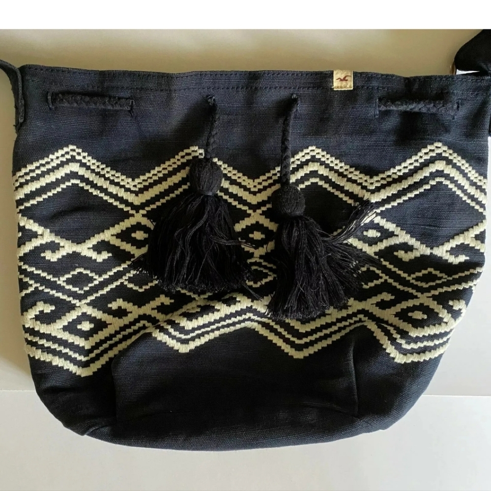 Hollister navy and white tassel purse/bag